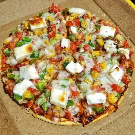 Cheese any two topic Pizza(onion, capsicum,corn,panner,tomato)